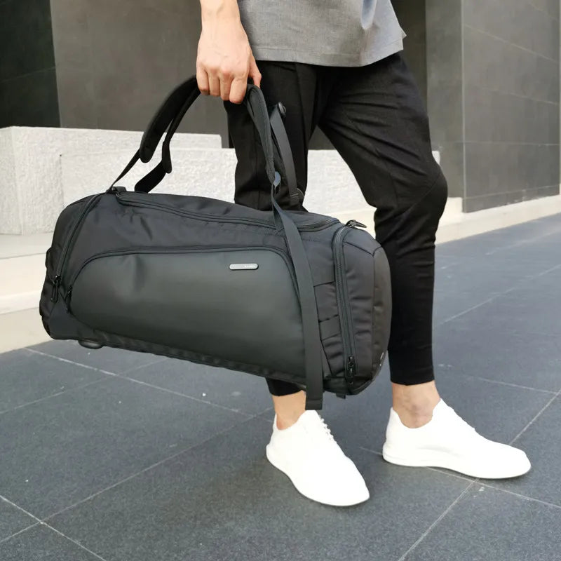 luxury travel bag for men held in hand - Grey - Gray - Black